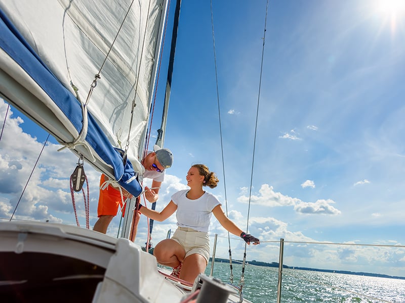 Young-woman-on-sailboat_KEY-1